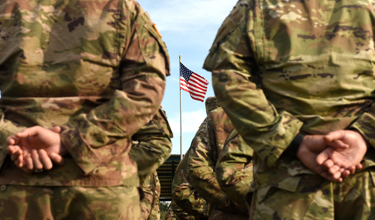 soldiers and flag